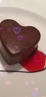 Heart-shaped chocolate dessert with sauce on a white plate.