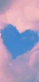 Heart-shaped blue sky with pink clouds.