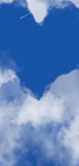 Heart-shaped cloud in blue sky wallpaper.