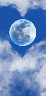 Heart-shaped clouds with full moon in blue sky.