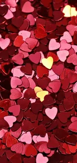 Heart-shaped confetti in red, pink, gold colors.