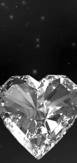 Heart-shaped diamond on dark starry background with sparkling effects.