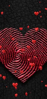 Red heart fingerprint design on black textured background.