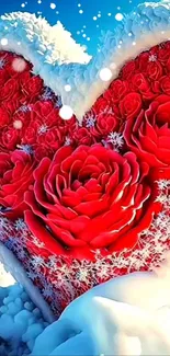 Heart sculpture with red roses and snow.