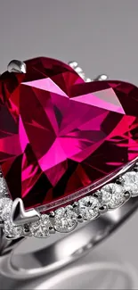 Heart-shaped pink gemstone with diamond accents on a sleek ring.
