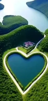 Aerial view of a heart-shaped lake surrounded by green hills.