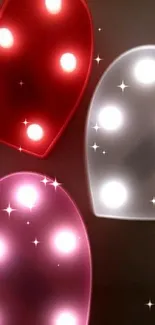 Three heart-shaped lights in red, pink, and white glow beautifully.