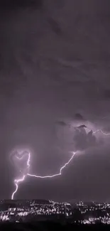 Heart-shaped lightning across a purple sky over a city at night.