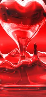 Heart-shaped liquid art in vibrant red tone.