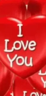 Red heart-shaped 'I Love You' wallpaper for mobile devices.