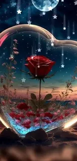 Heart-shaped glass with red rose at night on beach.