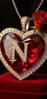 Elegant heart-shaped ruby necklace with a red rose accent.