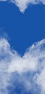 Heart-shaped cloud in a vibrantly blue sky wallpaper.