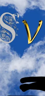 Heart cloud wallpaper with gold and silver letters on a blue sky background.