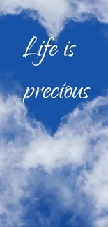 Heart-shaped blue sky with 'Life is precious' text.