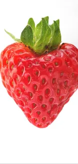 Heart-shaped strawberry on white background.