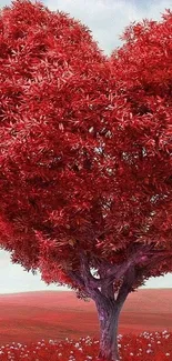 Heart-shaped red tree in a meadow wallpaper.