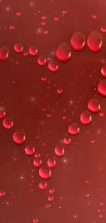 Heart-shaped water droplets on a red background.