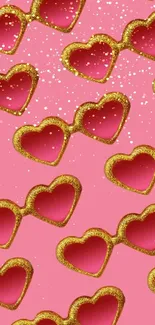 Pink wallpaper with glittery heart sunglasses pattern.