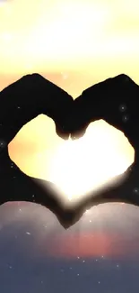 Heart silhouette against vibrant sunset sky wallpaper.