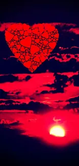 Vibrant heart above sunset in a red sky wallpaper.