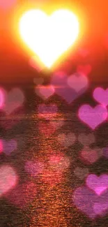 Romantic wallpaper with heart-shaped sunset over ocean.