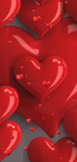 Mobile wallpaper with glossy red hearts on a sleek background.