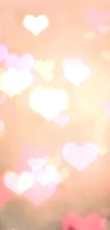 A dreamy heart-themed mobile wallpaper with soft, glowing pink and peach bokeh.