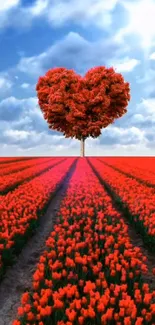 Heart-shaped tree above red tulip fields under a cloudy blue sky.