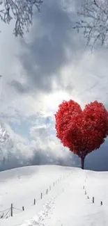 Heart-shaped tree in snowy landscape with cloudy sky.