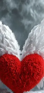 Fluffy red heart with angel wings over clouds.