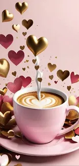 Decorative pink coffee cup with heart-themed design and gold accents.