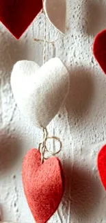 Hanging felt hearts in red and white