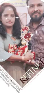 Couple holding a Krishna idol with love and devotion.