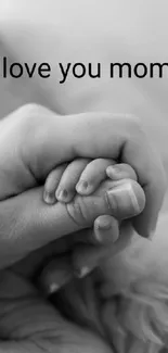 Black and white wallpaper of holding hands with 'Love You Mom' text.