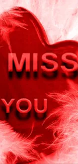 Red heart with 'I Miss You' text and feathers, mobile wallpaper.