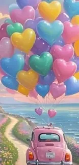 Pink car with heart balloons over a coastal path.