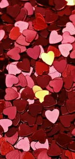 Vibrant red and pink heart confetti wallpaper.