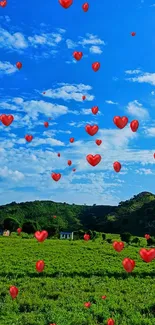 Scenic landscape with floating red hearts under a clear blue sky.