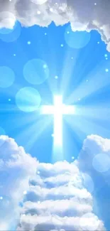 Heavenly cross shining in bright blue sky with surrounding clouds.