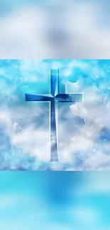 Crystal cross with blue clouds in serene sky wallpaper.