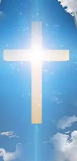 Radiant cross against a blue sky with clouds and light beams.