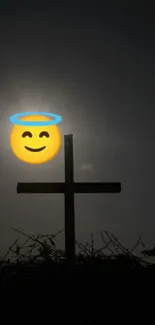 Cross silhouette with halo emoji against a dark sky background.