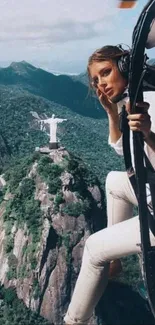 Woman on helicopter over Rio with Christ the Redeemer.