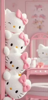 Cute Hello Kitty plush toys with a pink room background.