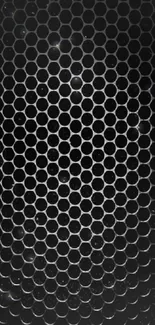 Dark wallpaper with hexagonal mesh pattern in black and gray tones.