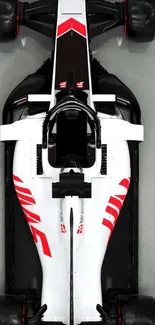 Top view of a high-speed race car with red and black design.