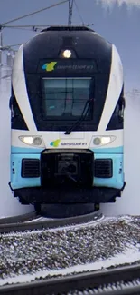 High-speed train traveling through snowy winter landscape.