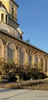 Historic building with blue sky background.