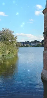 Historic castle by serene lake under a bright blue sky.